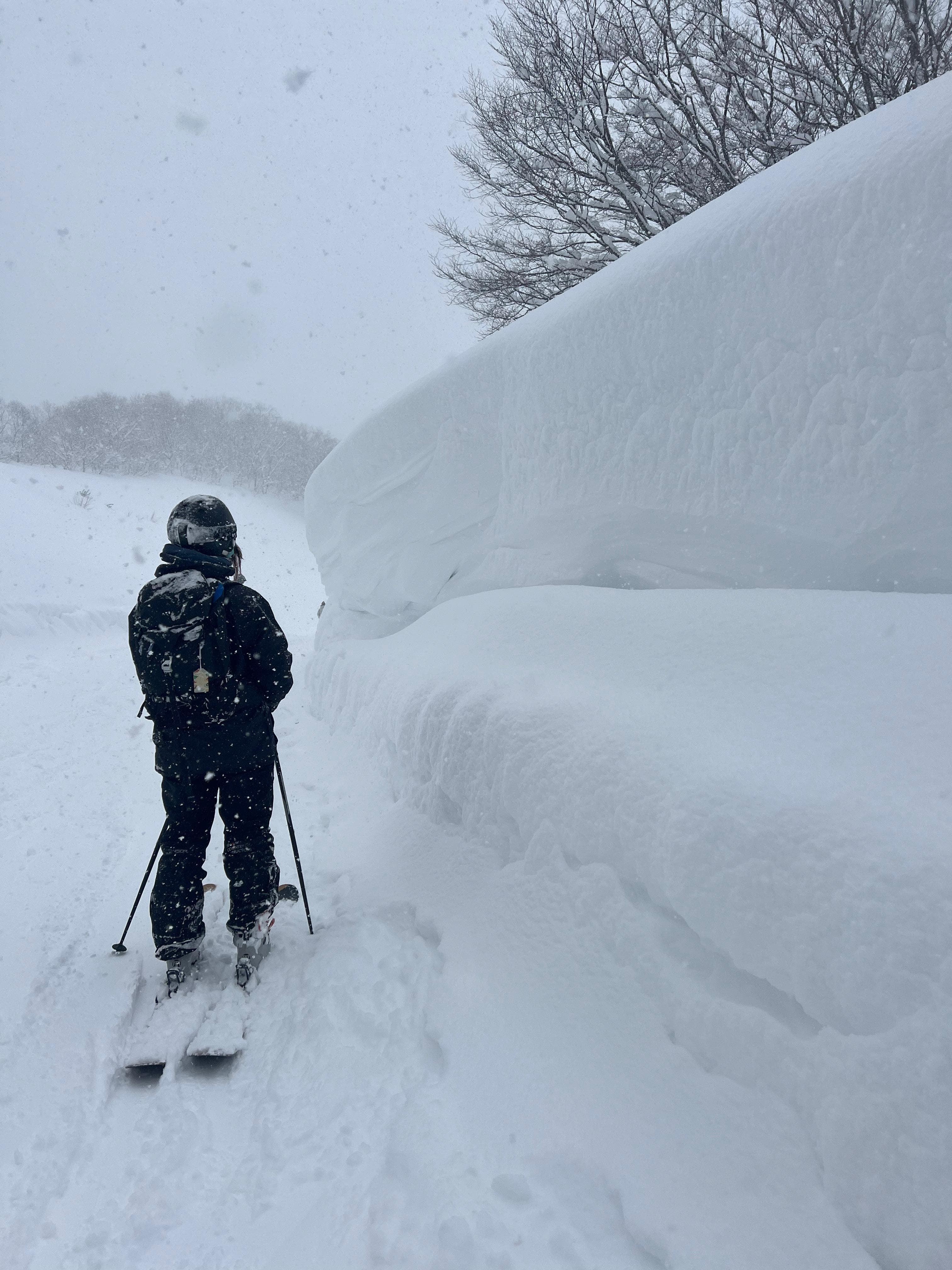 Florencia Segovia skiing in deep powder snow in Japan